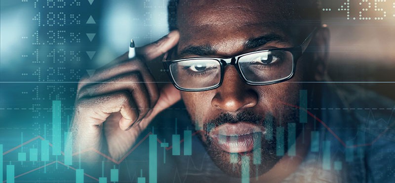 Man looking through a computer screen