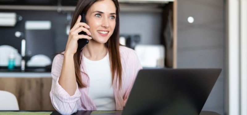 A woman talking to someone on her phone
