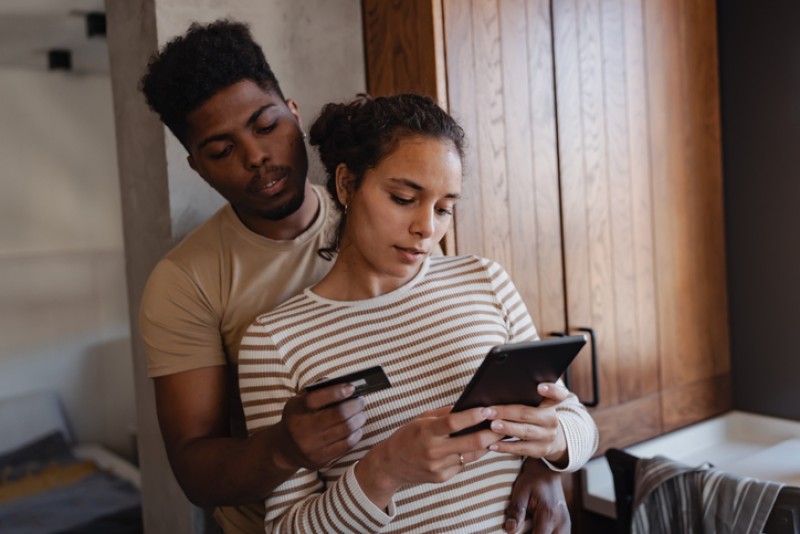 Couple making a mobile purchase