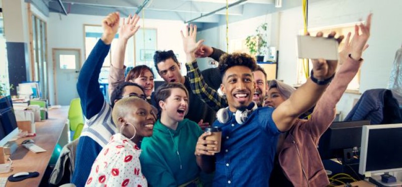 A group photo inside the office