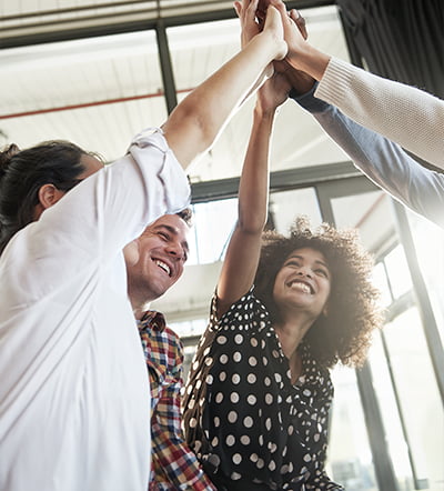 Team of employees celebrating