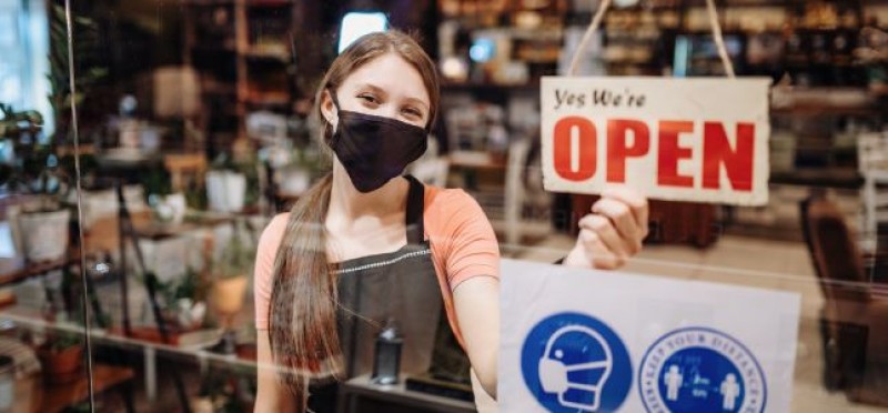 A store staff saying the store is open