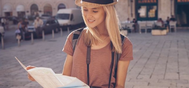 Tourist looking at a map