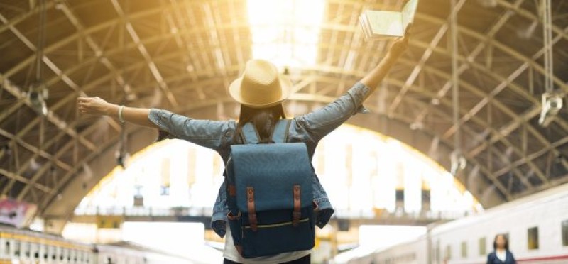 A woman at a train station