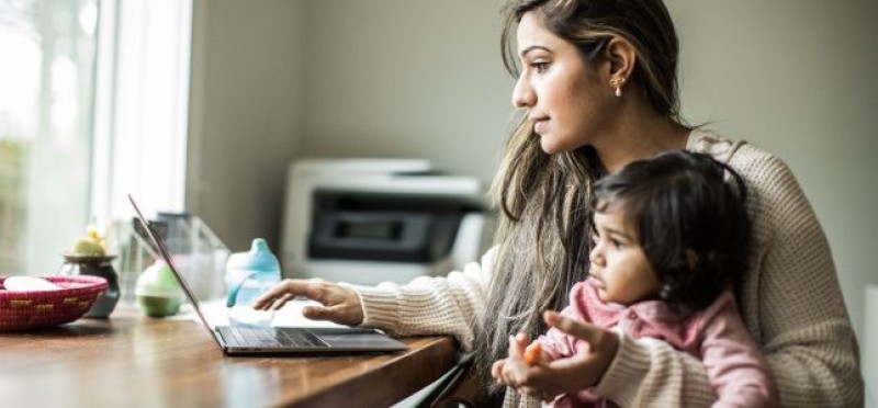A mom working from home with her baby