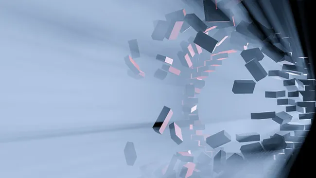 Brick wall being broken apart