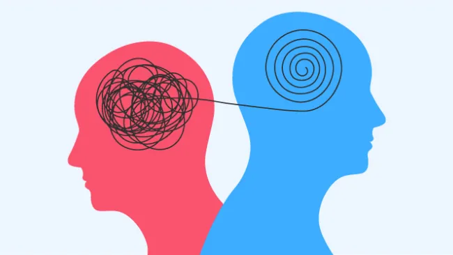 An illustration showing two people with a line connecting their brains