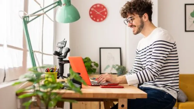 A happy man working from home