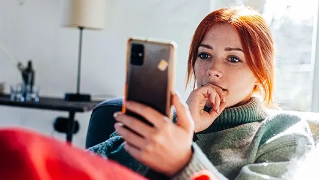 A woman checking her phone