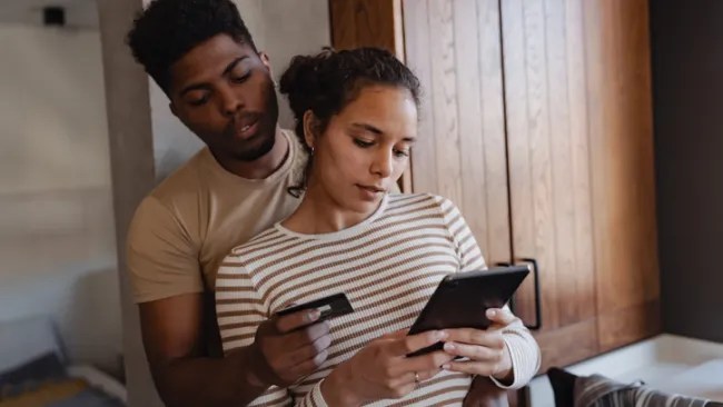 Couple making a mobile purchase