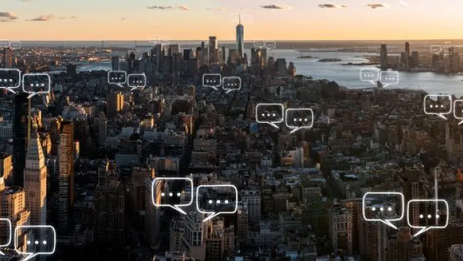 Chat bubbles outside the buildings