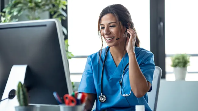 A healthcare professional on a video call