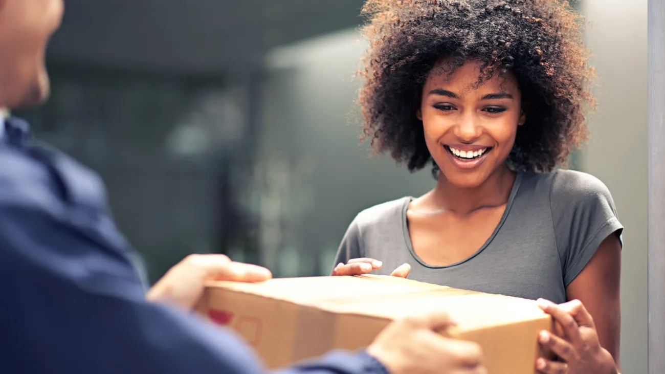 A lady receiving a package