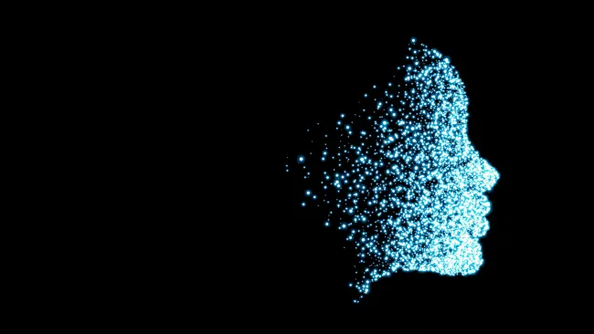 Graphic of woman's face in profile made from blue and white dots