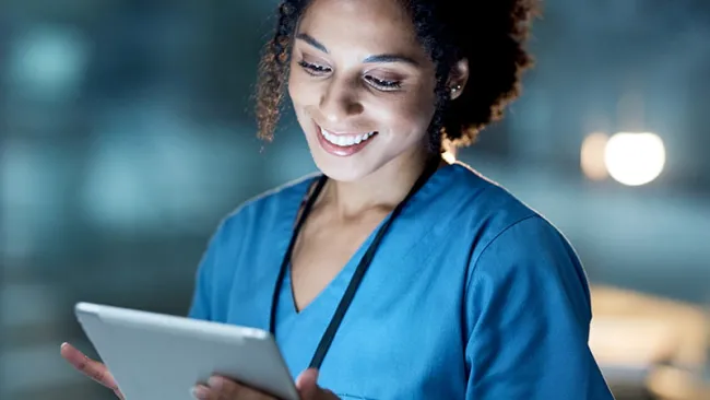 Nurse looking at a chart