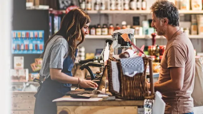 Customer making a purchase at a retail shop