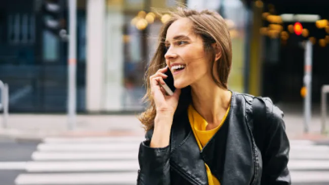 A woman talking to someone over the phone