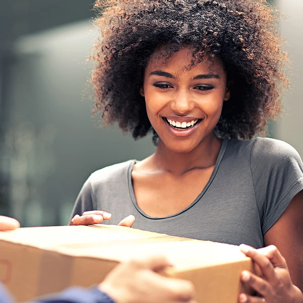 Woman accepting a delivery package