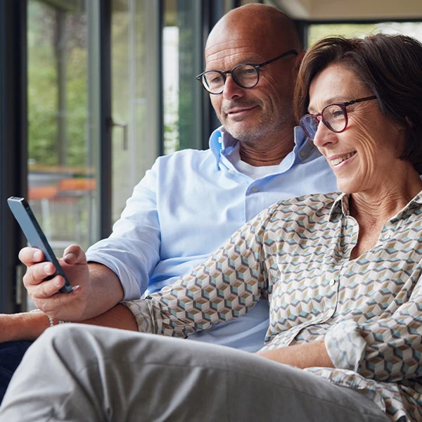 Couple looking at a shared phone screen