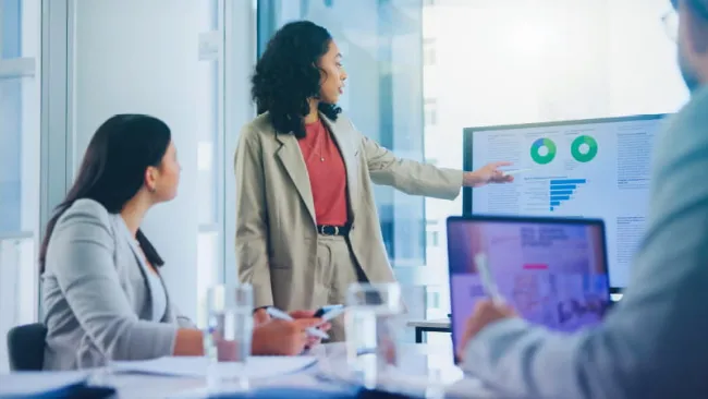 Employees collaborating in a conference room