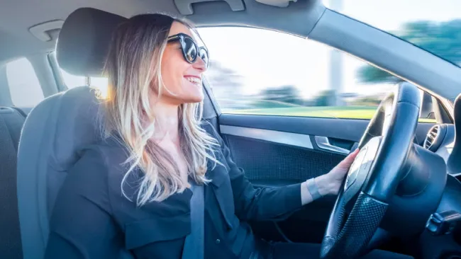 A customer driving their car