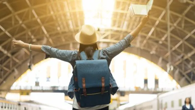 A woman at a train station