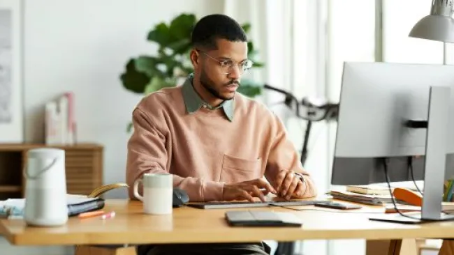 A guy at his workstation